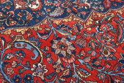 Surface texture of 1930s Bakhtiar rug with natural Wool and intricate pattern