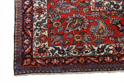 Surface texture of 1930s Bakhtiar rug with natural Wool and intricate pattern