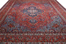 Surface texture of 1930s Bakhtiar rug with natural Wool and intricate pattern