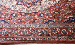 Corner detail of 1930s Bakhtiar rug showing border pattern and Wool pile