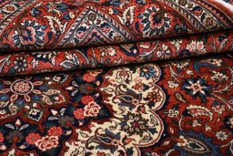 Backside of handmade 1930s Bakhtiar rug showing knot structure and weave density