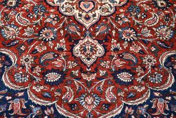 Backside of handmade 1930s Bakhtiar rug showing knot structure and weave density
