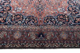 Corner detail of 1930s Bakhtiar rug showing border pattern and Wool pile