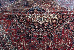 Surface texture of 1930s Bakhtiar rug with natural Wool and intricate pattern