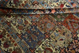 Corner detail of 2000s Bakhtiar rug showing border pattern and Wool pile