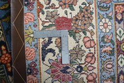 Surface texture of 2000s Bakhtiar rug with natural Wool and intricate pattern