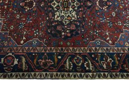 Full view of 1930s Bakhtiar rug from Iran / Persia, 200 × 160 cm in Red tones