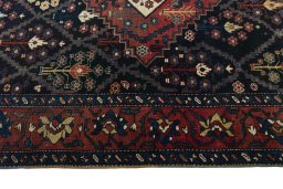 Corner detail of 1930s Bakhtiar rug showing border pattern and Wool pile