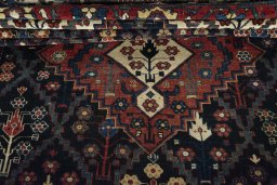 Close-up detail of 1930s Bakhtiar rug from Iran / Persia showing Wool weave