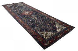Close-up detail of 1930s Bakhtiar rug from Iran / Persia showing Wool weave