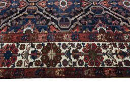 Full view of 1930s Bakhtiar rug from Iran / Persia, 380 × 332 cm in Blue tones