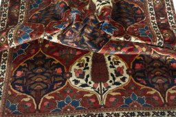 Corner detail of 1950s Bakhtiar rug showing border pattern and Wool pile