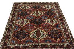Surface texture of 1950s Bakhtiar rug with natural Wool and intricate pattern