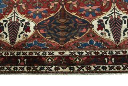 Central medallion detail of 1950s Bakhtiar rug from Iran / Persia