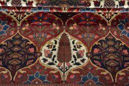 Full view of 1950s Bakhtiar rug from Iran / Persia, 192 × 154 cm in Red tones