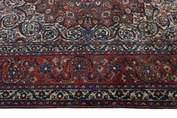Corner detail of 1950s Bakhtiar rug showing border pattern and Wool pile