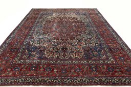 Surface texture of 1950s Bakhtiar rug with natural Wool and intricate pattern