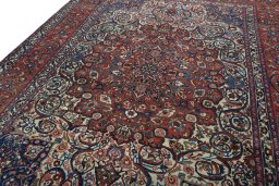 Backside of handmade 1950s Bakhtiar rug showing knot structure and weave density