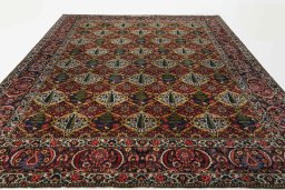 Surface texture of 1930s Bakhtiar rug with natural Wool and intricate pattern