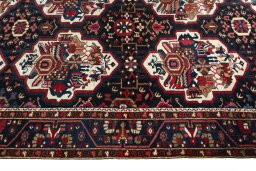 Close-up detail of 1950s Bakhtiar rug from Iran / Persia showing Wool weave
