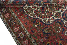 Corner detail of 1930s Bakhtiar rug showing border pattern and Wool pile