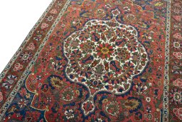 Backside of handmade 1930s Bakhtiar rug showing knot structure and weave density