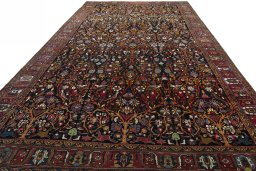 Surface texture of 1930s Bakhtiar rug with natural Wool and intricate pattern