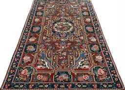 Surface texture of 1930s Bakhtiar rug with natural Wool and intricate pattern
