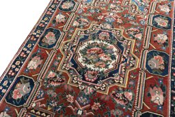 Backside of handmade 1930s Bakhtiar rug showing knot structure and weave density