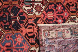Close-up detail of 1970s Bakhtiar rug from Iran / Persia showing Wool weave