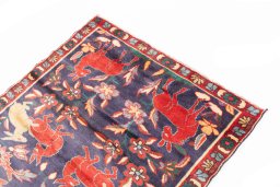 Surface texture of 1970s Bakhtiar rug with natural Wool and intricate pattern