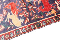 Backside of handmade 1970s Bakhtiar rug showing knot structure and weave density