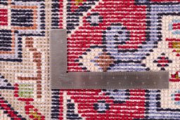 Backside of handmade 1960s Bakhtiar rug showing knot structure and weave density