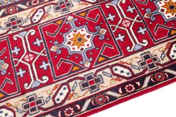 Backside of handmade 1960s Bakhtiar rug showing knot structure and weave density