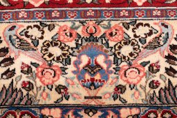 Corner detail of 2000s Bakhtiar rug showing border pattern and Wool pile