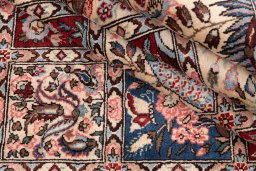 Surface texture of 2000s Bakhtiar rug with natural Wool and intricate pattern