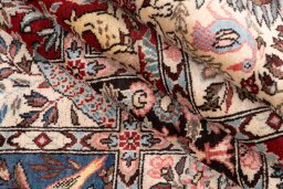 Backside of handmade 2000s Bakhtiar rug showing knot structure and weave density