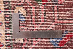 Surface texture of 1985s Bakhtiar rug with natural Wool and intricate pattern