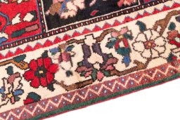 Backside of handmade 1985s Bakhtiar rug showing knot structure and weave density