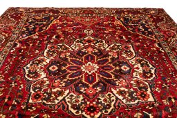 Corner detail of 1990s Bakhtiar rug showing border pattern and Wool pile