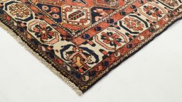 Backside of handmade 1990s Bakhtiar rug showing knot structure and weave density