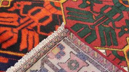 Close-up detail of 1990s Bakhtiar rug from Iran / Persia showing Wool weave