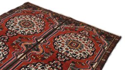 Surface texture of 2000s Bakhtiar rug with natural Wool and intricate pattern