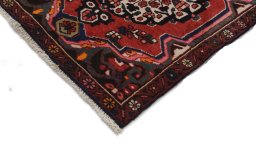 Backside of handmade 2000s Bakhtiar rug showing knot structure and weave density