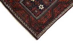 Backside of handmade 1900s Baloch rug showing knot structure and weave density