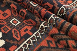 Full view of 1900s Baloch rug from Afghanistan, 450 × 94 cm in Red tones