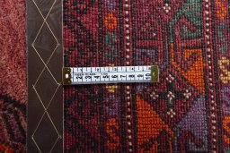 Close-up detail of 2000s Baloch rug from Iran / Persia showing Wool weave