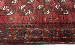 Close-up detail of 2000s Baloch rug from Iran / Persia showing Wool weave