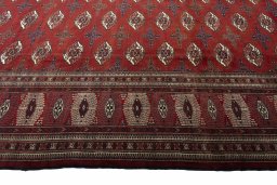 Close-up detail of 2000s Baloch rug from Iran / Persia showing Wool weave