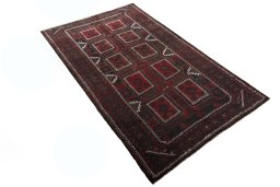 Close-up detail of 2000s Baloch rug from Iran / Persia showing Wool weave